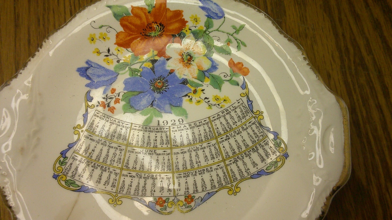 souvenir plate from Elmwood Ill. Eskil Johnson Bakery calendar plate 1929 Z87