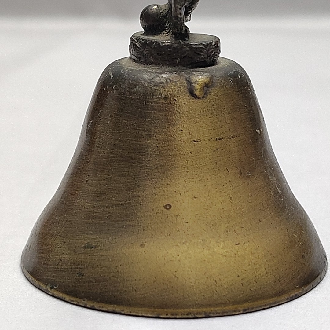 New Orleans Square Souvenir Mementos Brass Cow Bell Embellished Crown Axe Sword