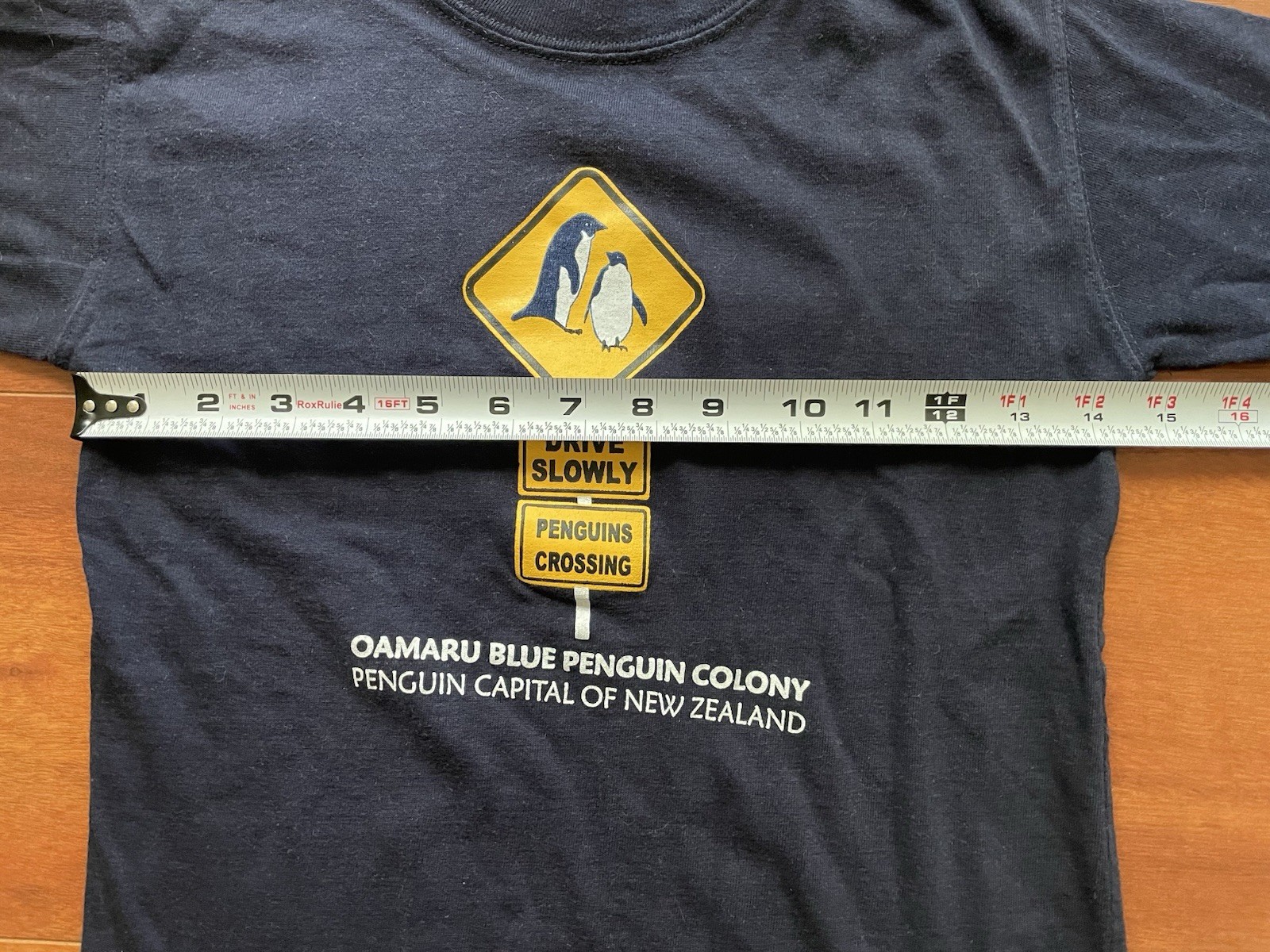 Blue Penguin T-Shirt from Oamaru New Zealand – Navy, Size 6 (US XXS)