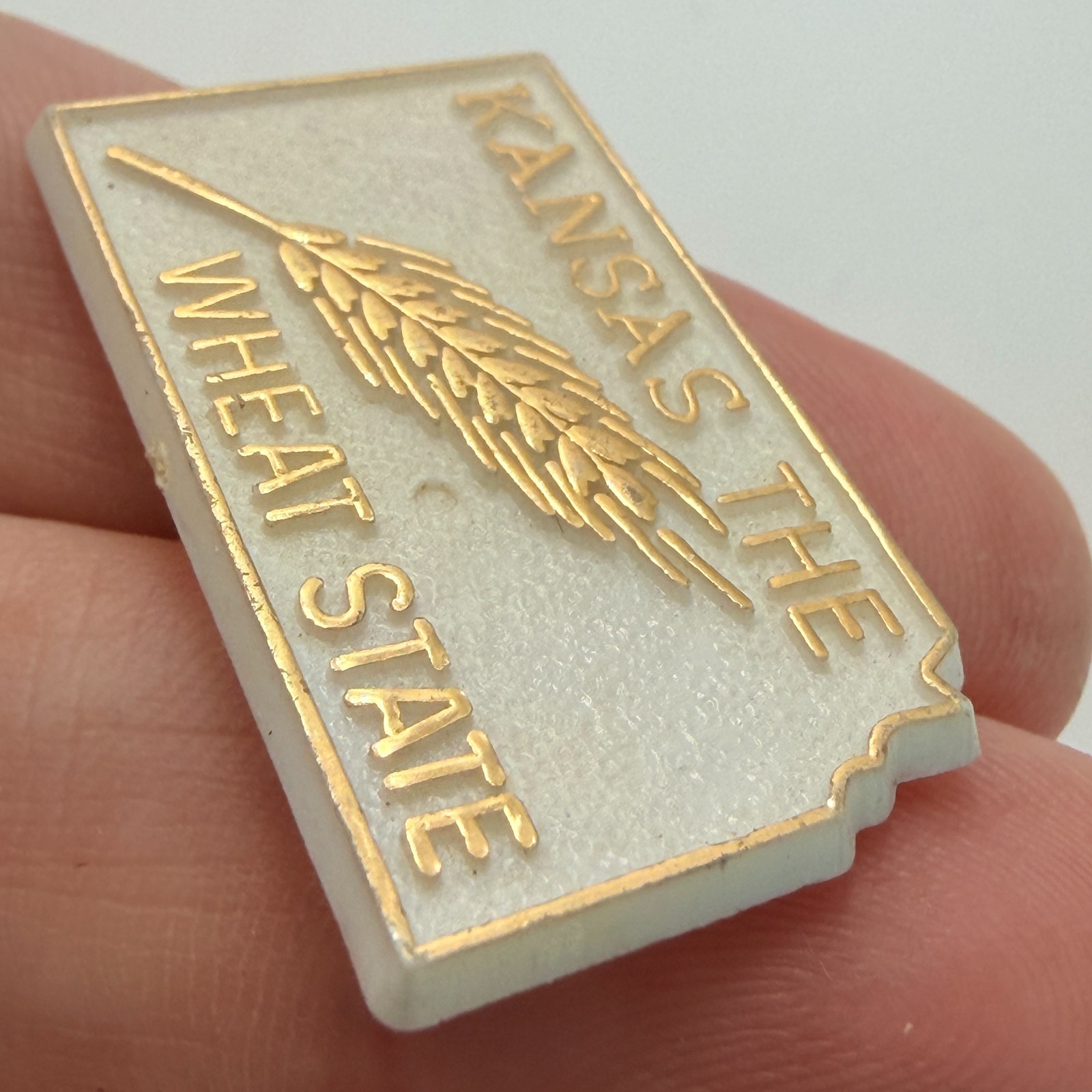 Kansas The Wheat State Map Shape Lapel Pin White Plastic Travel Tourist Souvenir