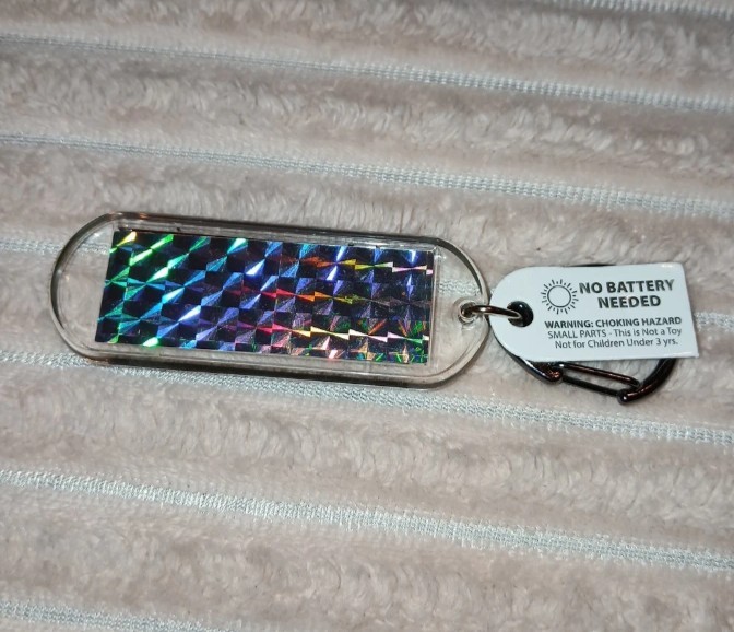 WILD THING – Acrylic Blinking Solar Powered Keychain 4.25” Long w/Snap Keyring