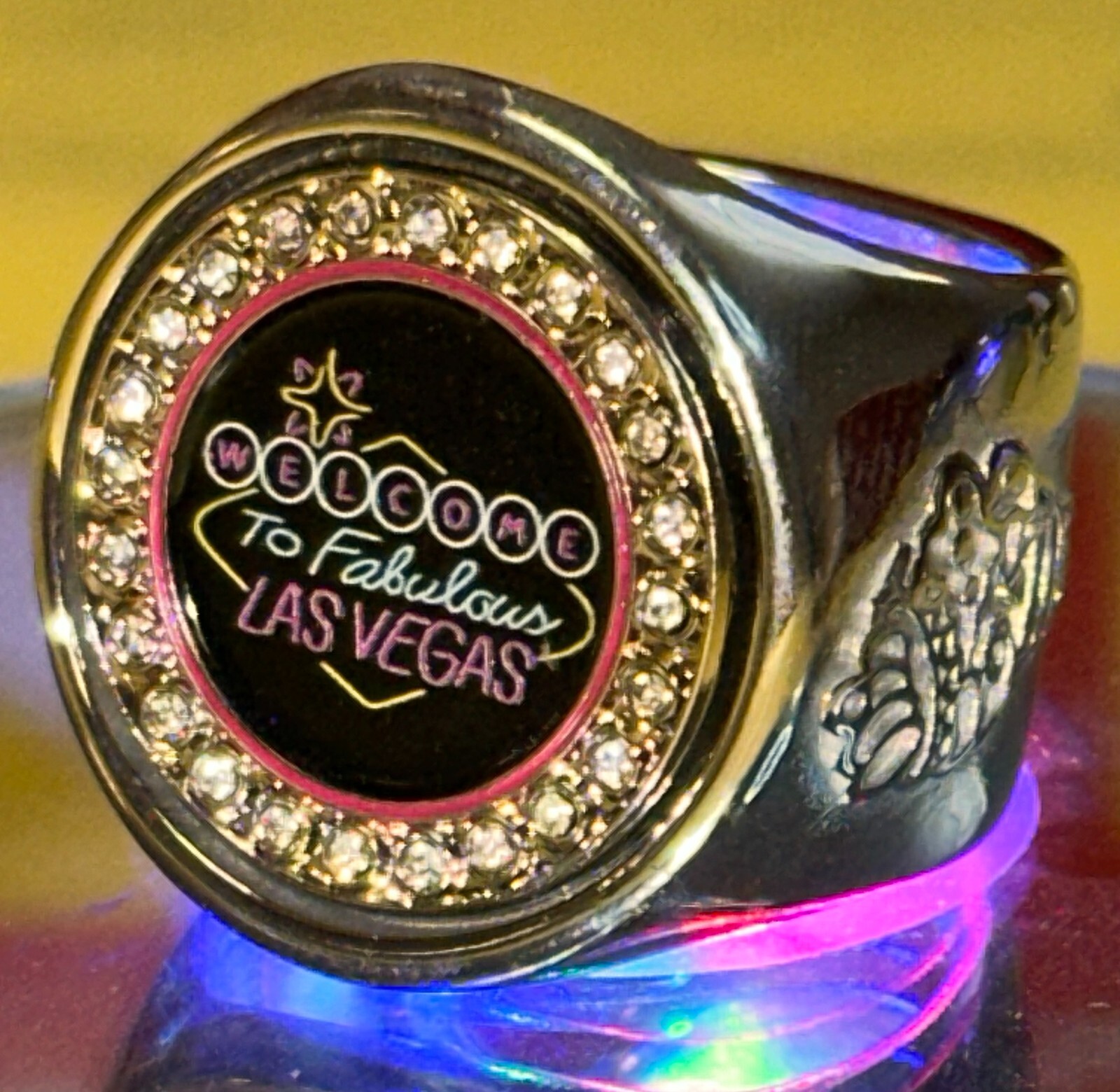 The Welcome to Las Vegas deCAPitator ring bottle cap and can tab opener!