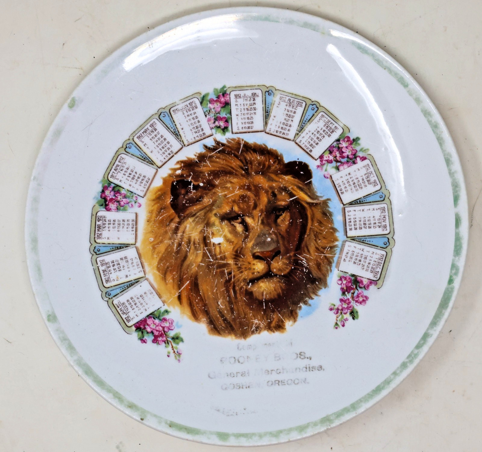Antique 1912 Advertising Calendar Plate Goshen Oregon Lion Rooney Brothers
