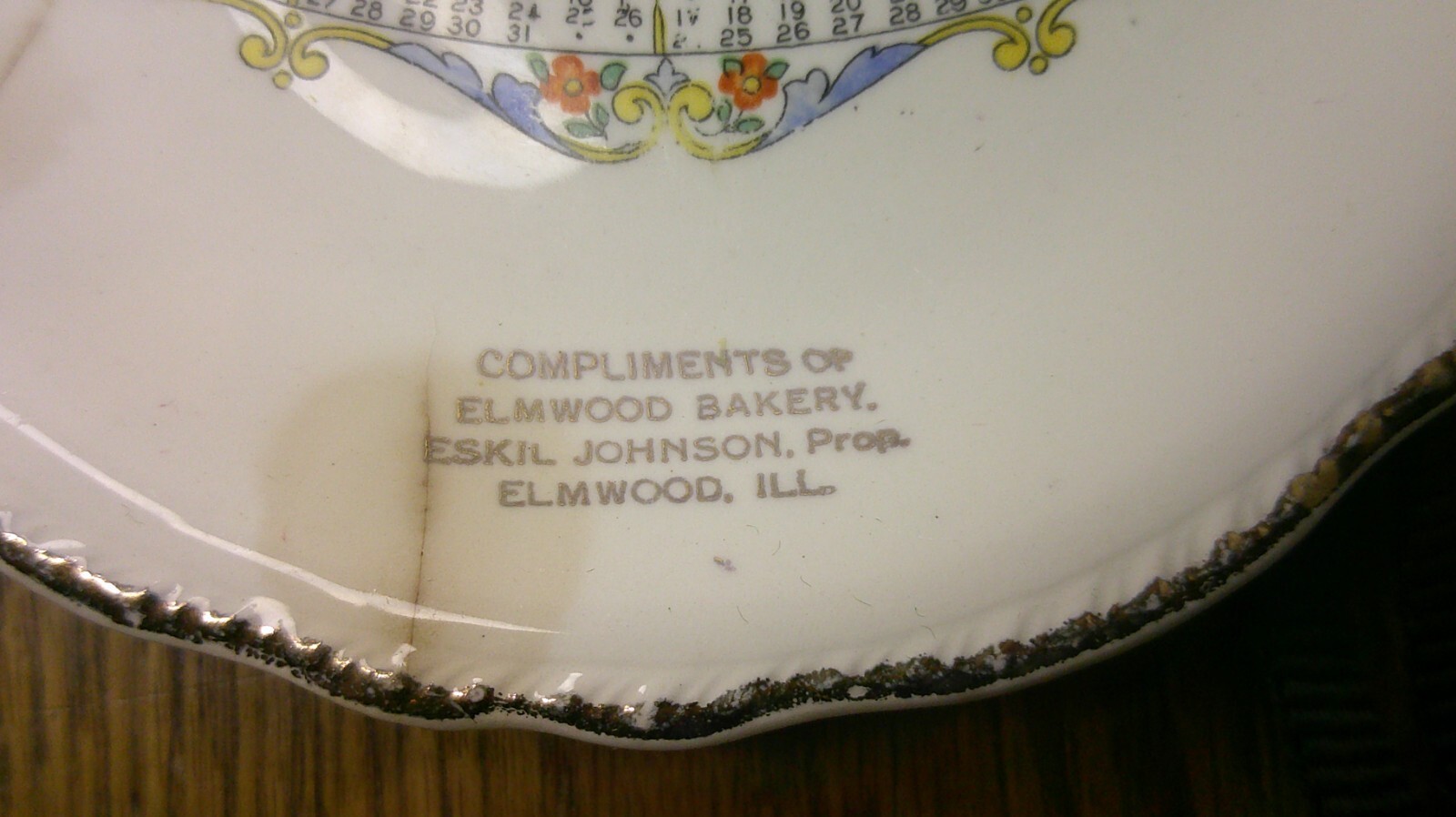 souvenir plate from Elmwood Ill. Eskil Johnson Bakery calendar plate 1929 Z87