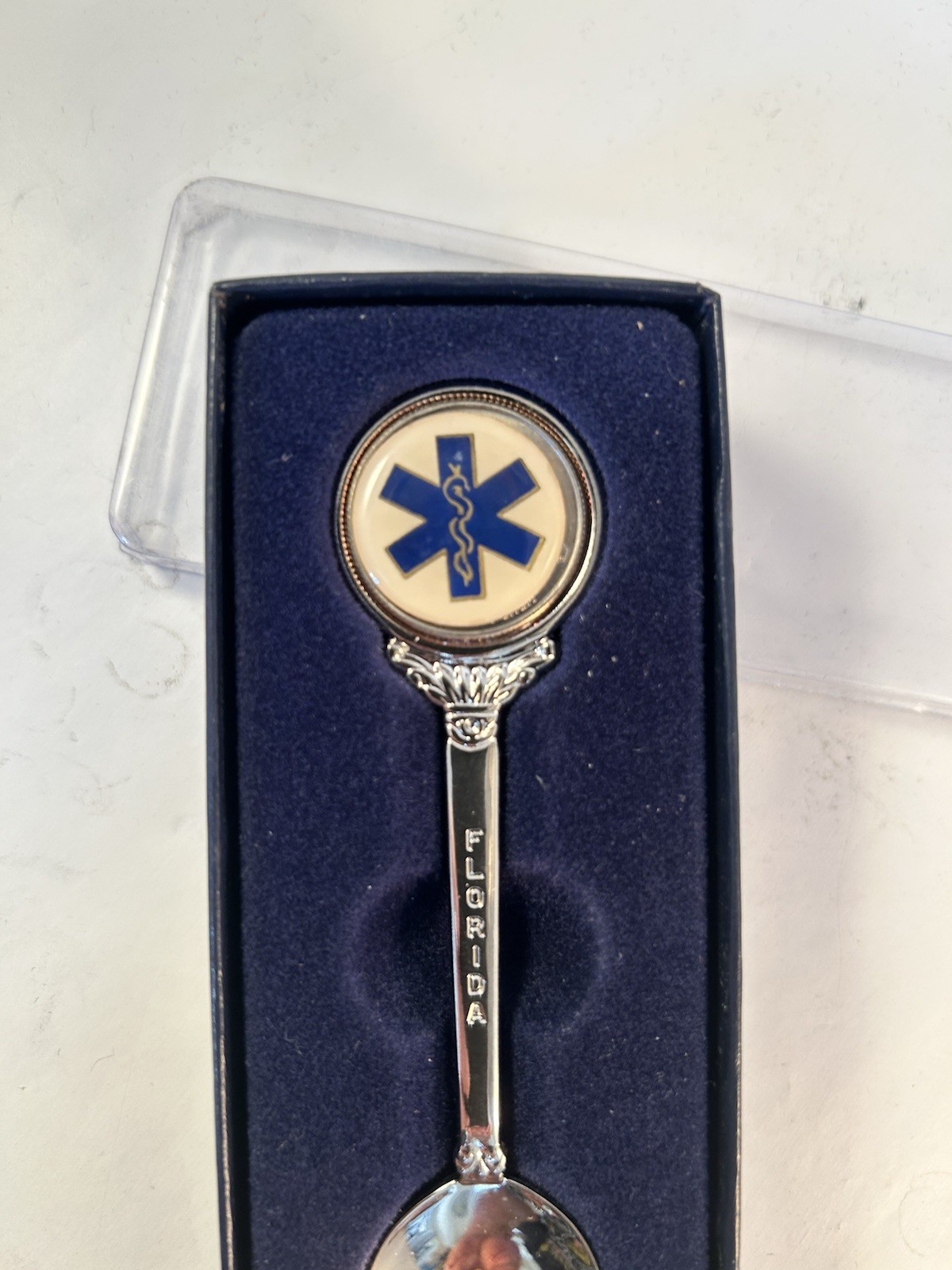 EMS Logo on a 50 State Quarter Spoon With Florida On The Stem U.S.Mint back