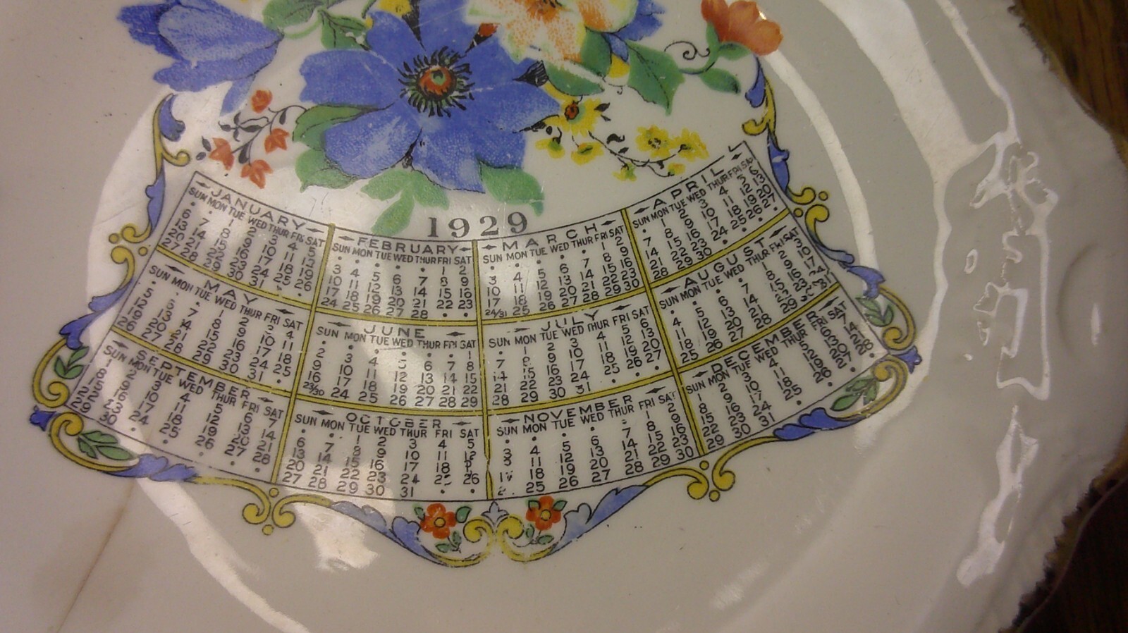 souvenir plate from Elmwood Ill. Eskil Johnson Bakery calendar plate 1929 Z87